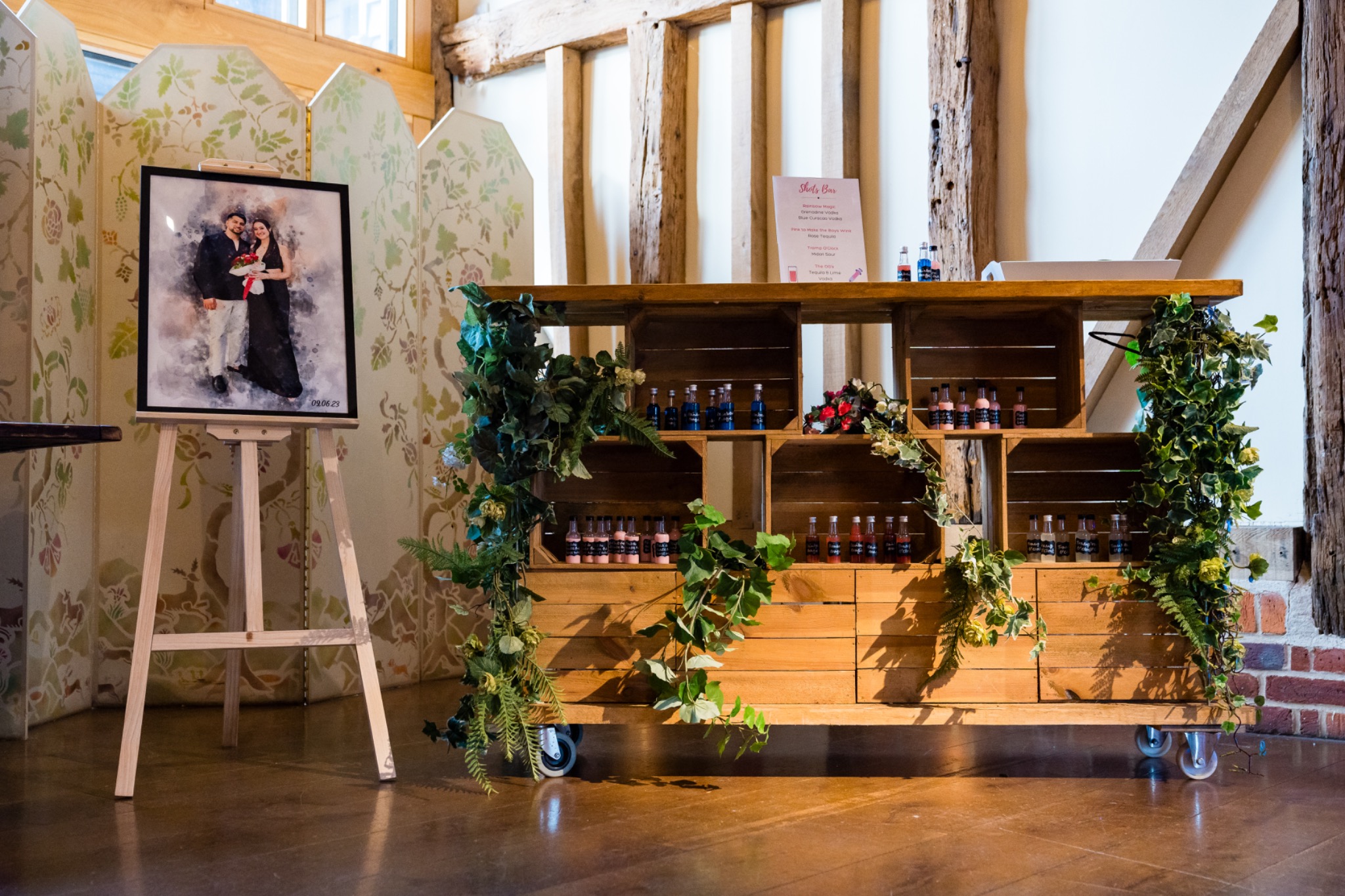 Rustic styled event bar with greenery