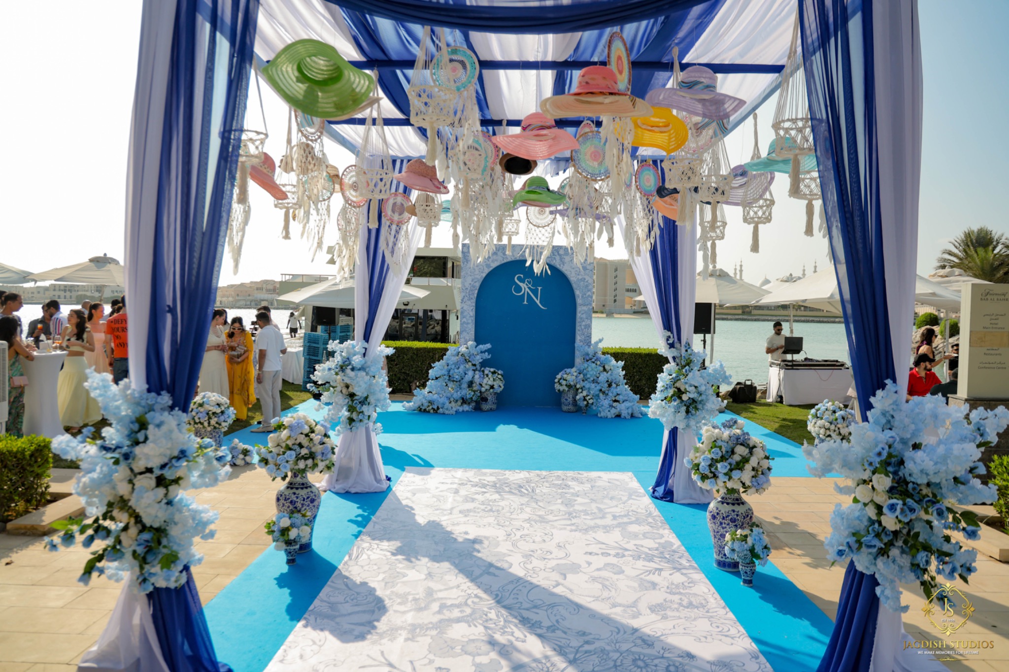 Blue and white waterfront wedding styling
